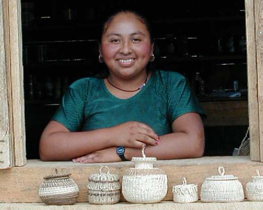 Mayan lady selling handcrafted baskets